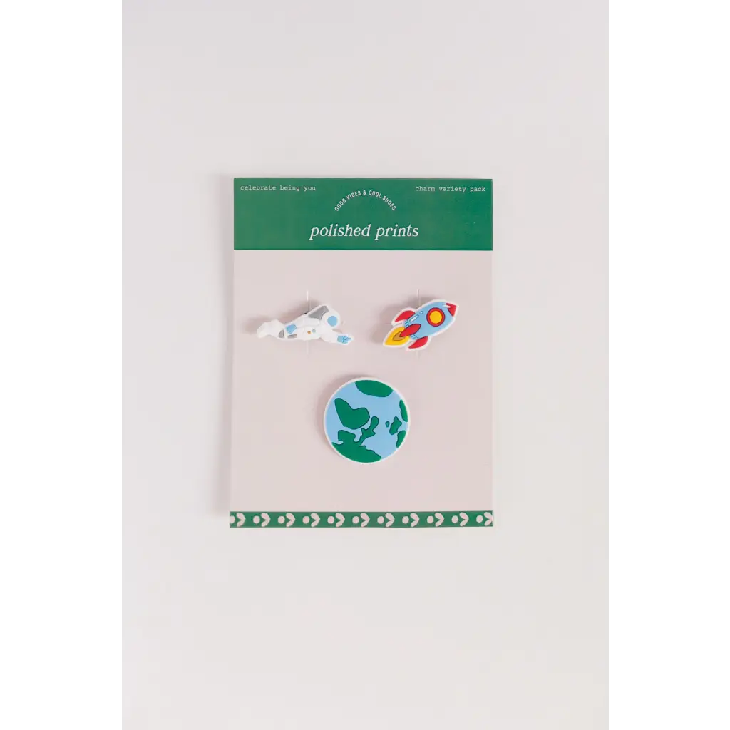 Colorful 3-piece outer space charm set with rocket, Earth, and clouds enamel pins