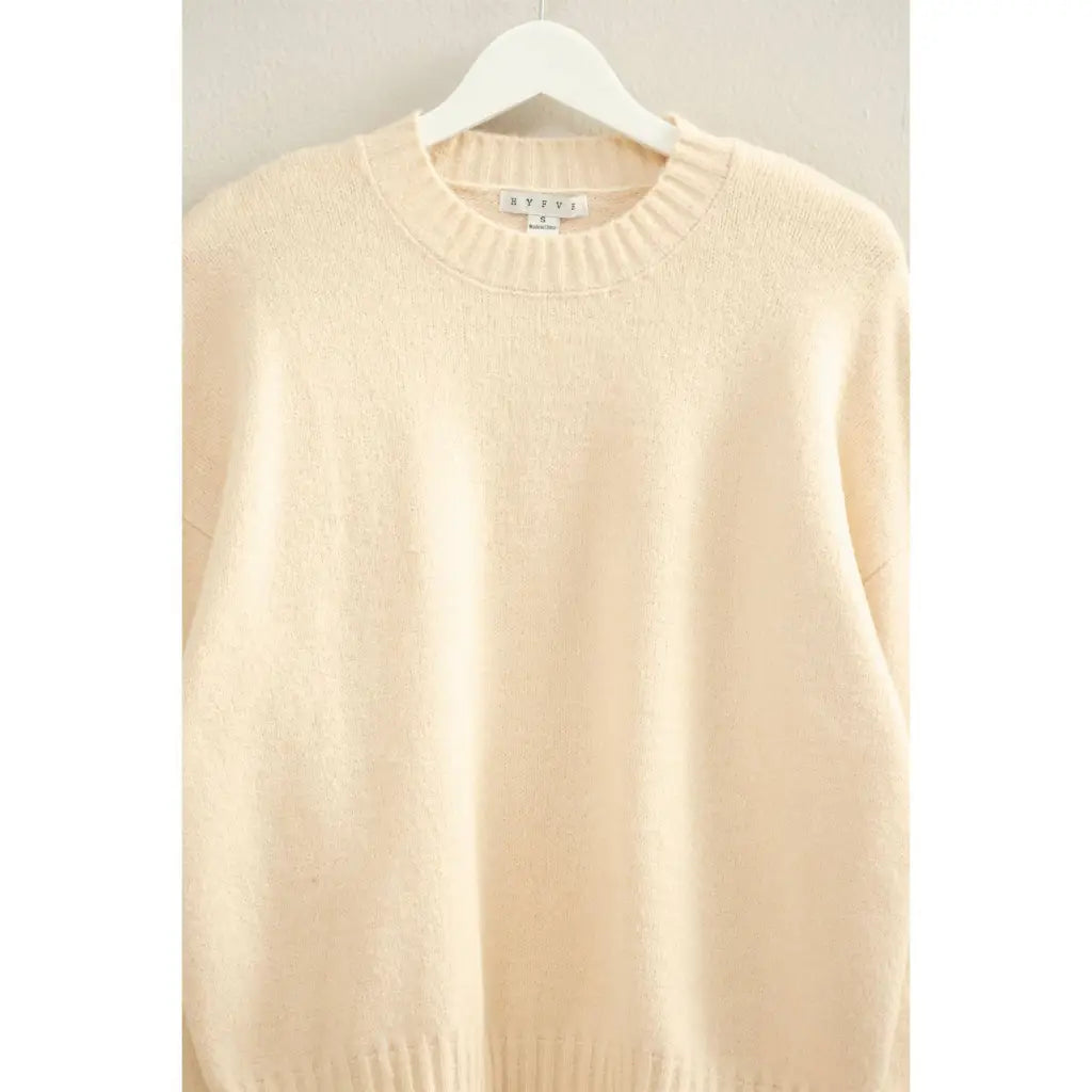 Cream cashmere oversized drop shoulder sweater with ribbed neckline