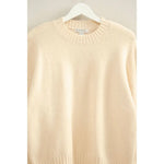Cream cashmere oversized drop shoulder sweater with ribbed neckline