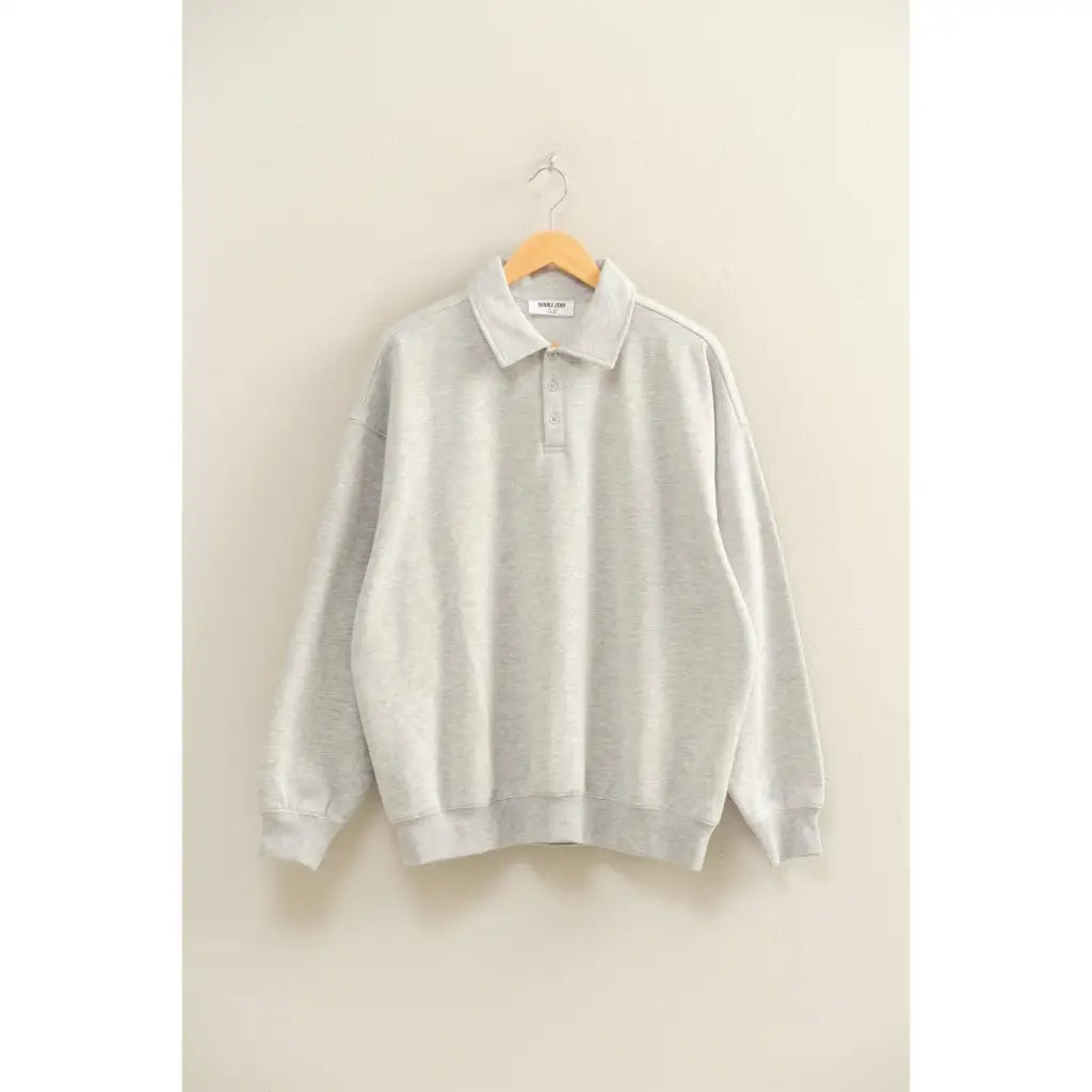 Light gray oversized polo pullover with collar, stylish womens clothes