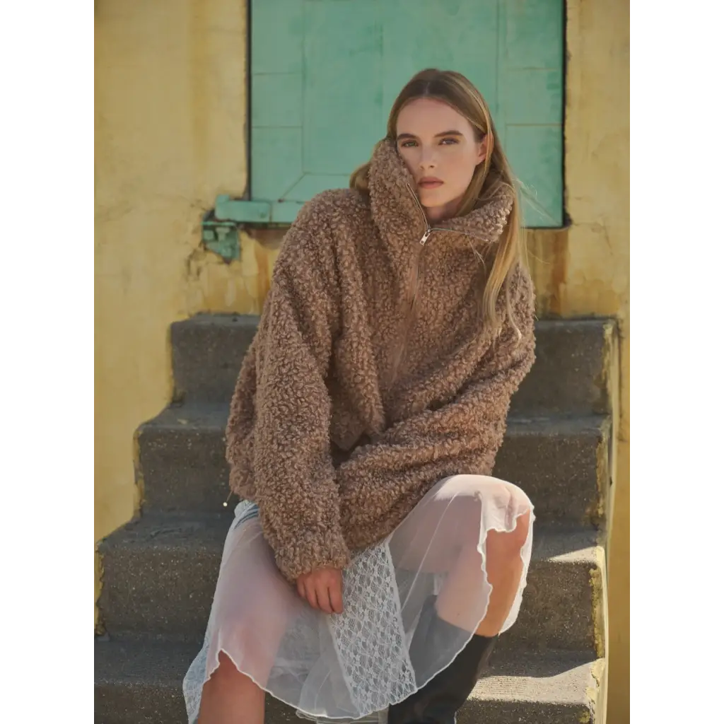 Cozy brown sherpa fleece half-zip hoodie paired with a cute white lace skirt