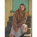 Cozy brown sherpa fleece half-zip hoodie paired with a cute white lace skirt