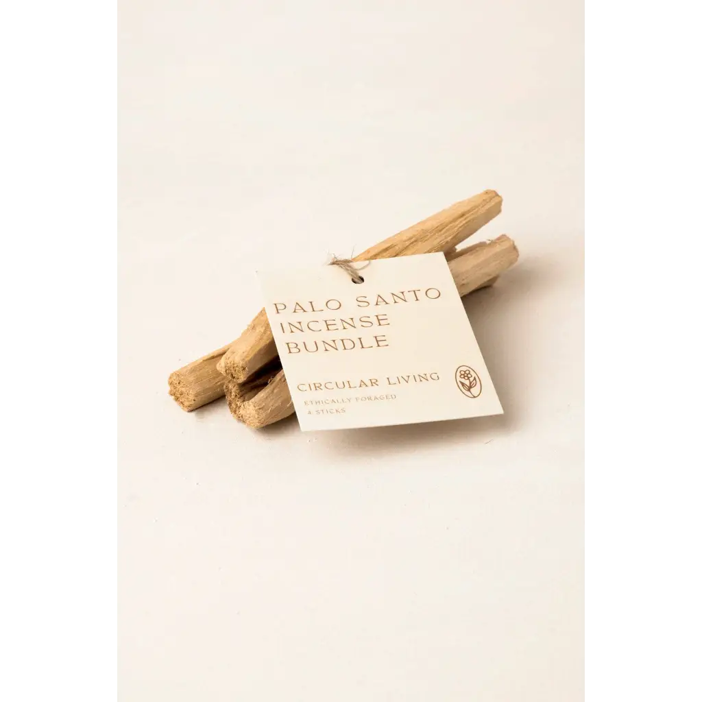 Palo santo incense bundle with natural wood sticks and white label