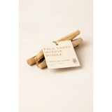 Palo santo incense bundle with natural wood sticks and white label