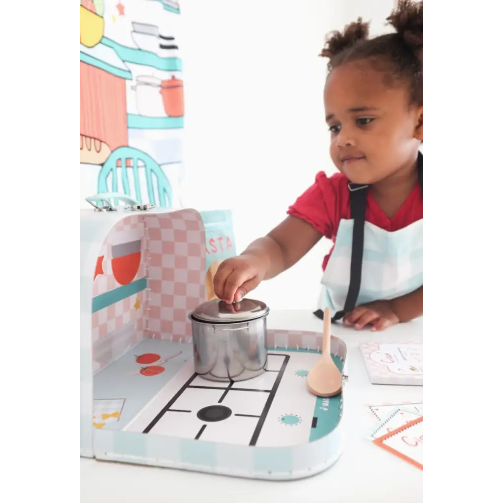 Child having fun with the Pasta Shop Play Kit for creative pretend play adventures