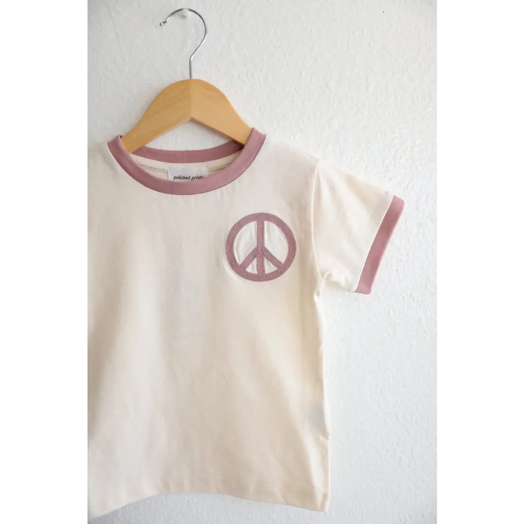 Cream Peace Embroidered Ringer Tee for Kids with mauve trim and peace symbol design