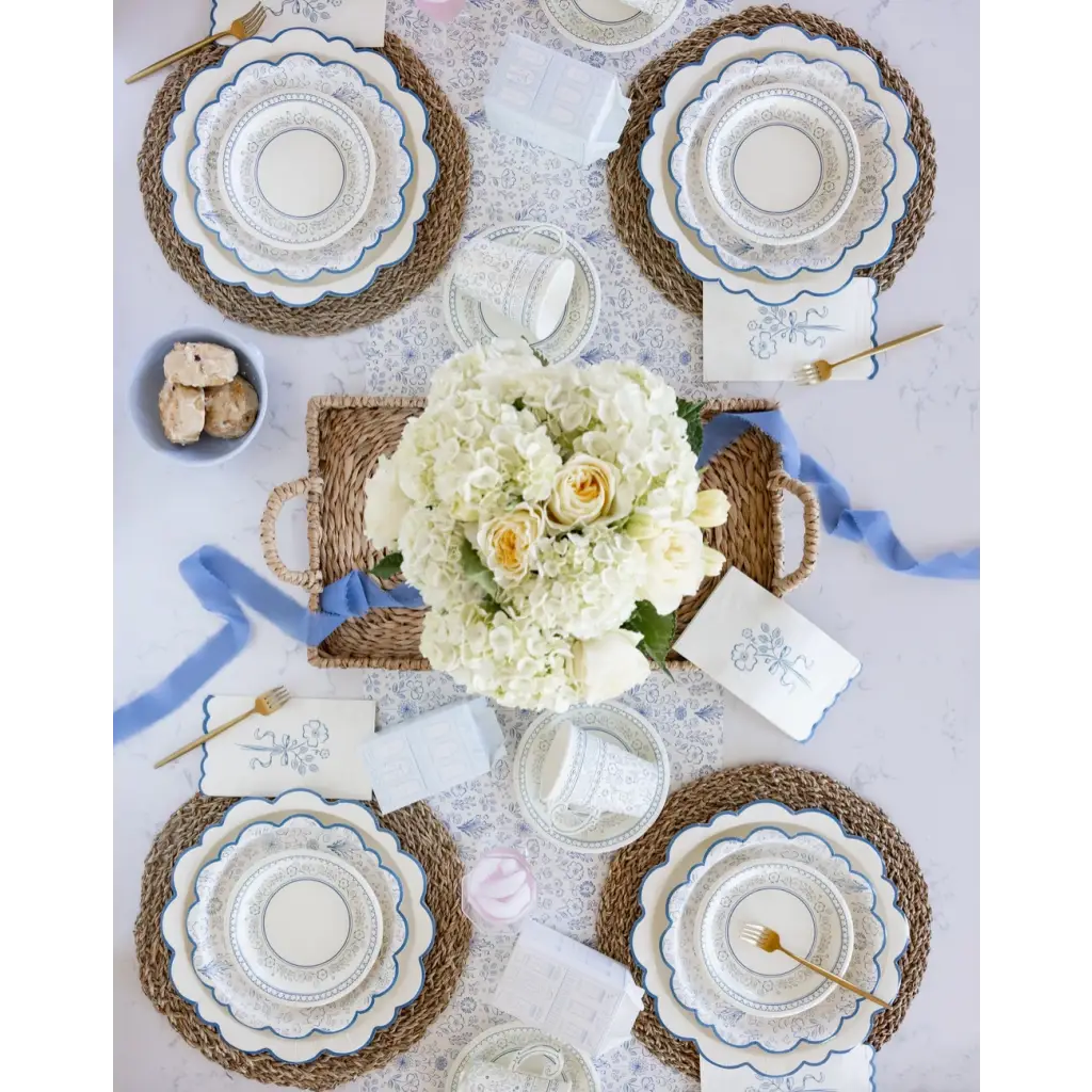 Elegant table setting featuring the Pembroke Floral Paper Table Runner for stylish dining