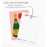 Notecard with champagne and strawberry design, perfect for polished prints lovers