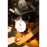 Personalized embroidered Easter basket name tag on woven basket