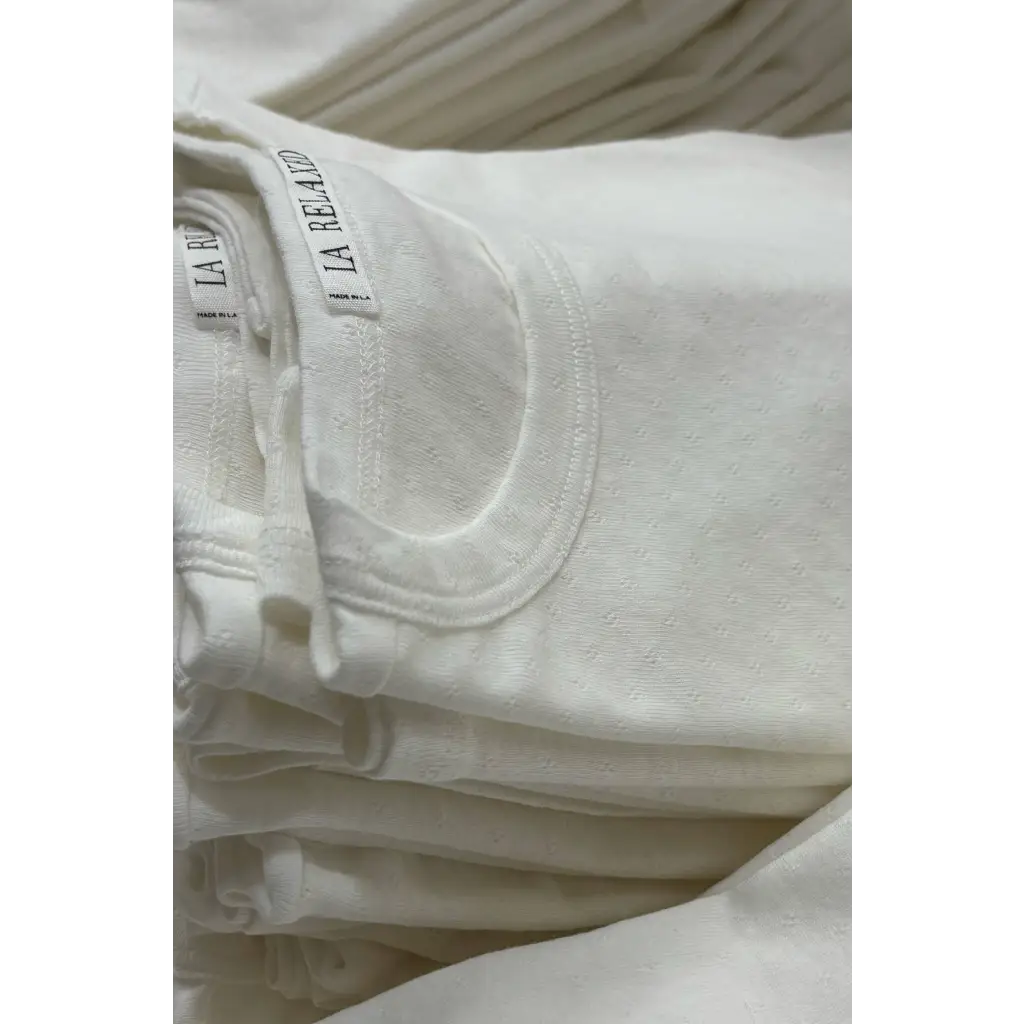 Petit pointelle organic cotton tee with la rela label