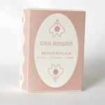 Pale pink Petite Rituals ollie blossom bath soak, facial steam, face mask set in compostable bag