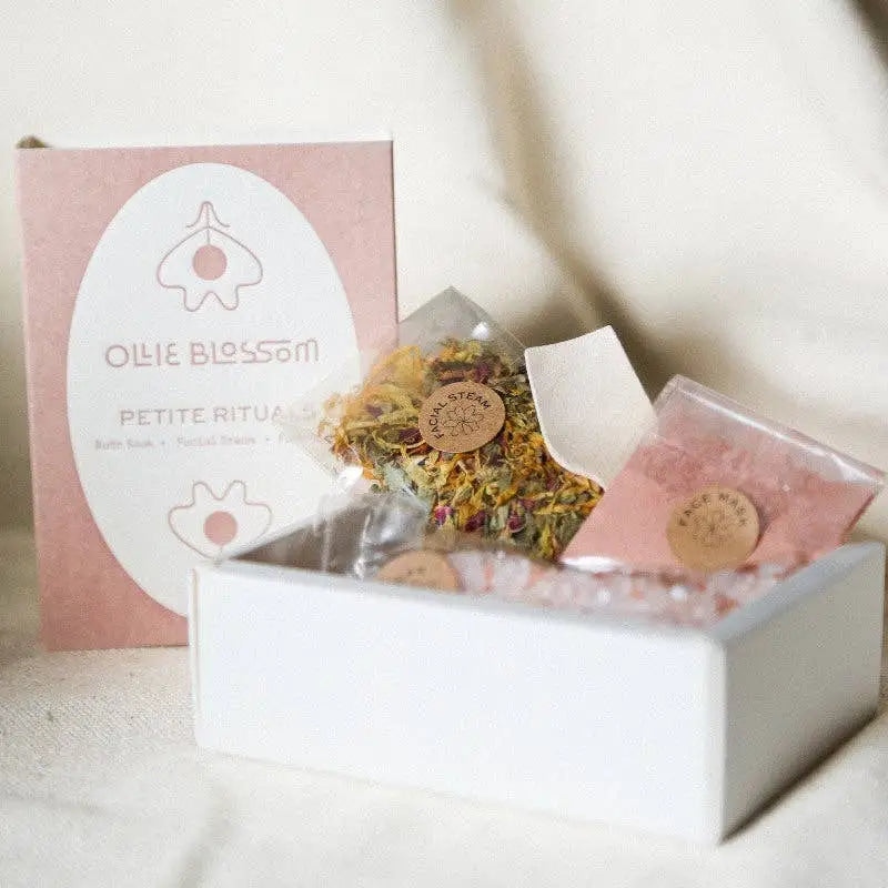 Petite Rituals white gift box with pink gold accents, herbal tea and bath salts