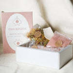Petite Rituals white gift box with pink gold accents, herbal tea and bath salts