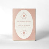 Rose gold Petite Rituals box with floral design on blush background