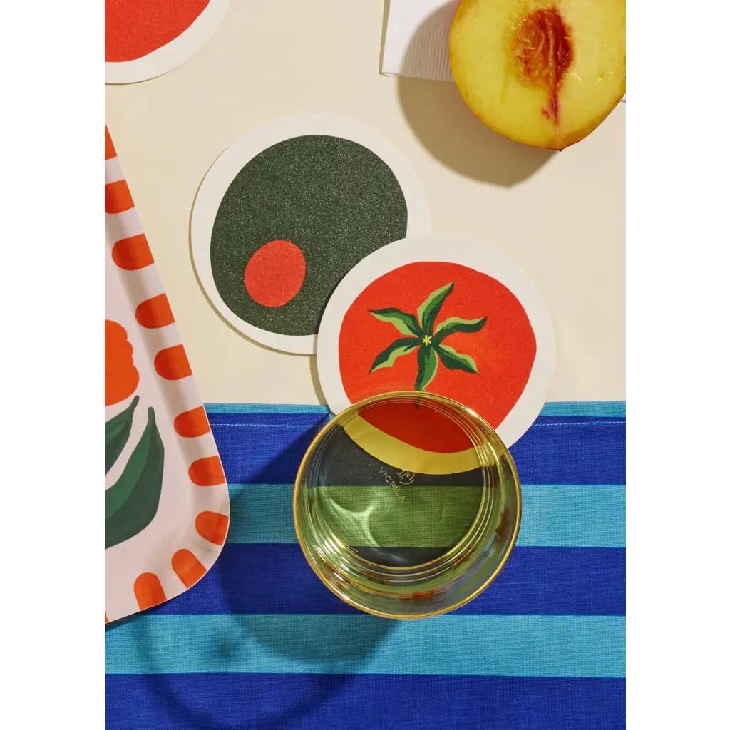 Colorful fruit and vegetable-themed coasters with polished prints, perfect for stylish moms