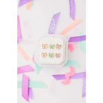 Gold bow stud earrings with colorful enamel in display case