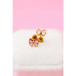 Shiny gold and pink bow stud earrings with glossy finish