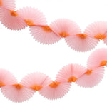 Pink Honeycomb Fan Garland with orange-edged tissue paper for festive parties