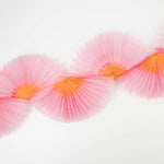 Pink honeycomb fan garland with orange tissue paper fans