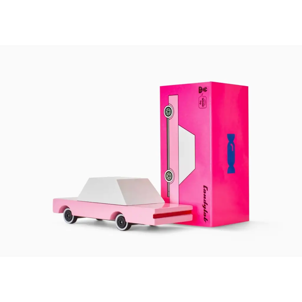 Cute pink sedan toy car in solid beech wood with a matching pink box for fun playtime