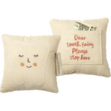 Cream-colored tooth fairy pillow with embroidered face and pocket, perfect fairy pillow