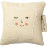 Cream-colored embroidered tooth fairy pillow with face perfect for your tooth fairy needs