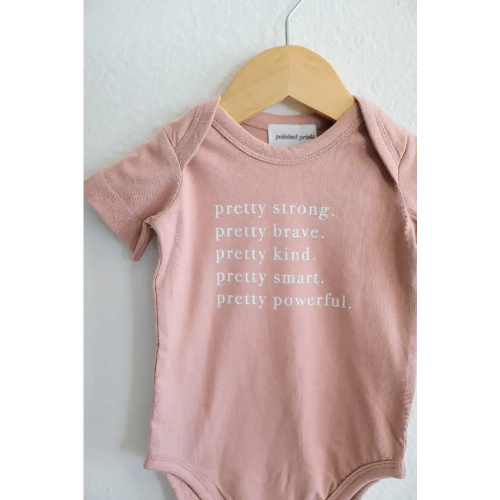 Pretty Brave Organic Cotton Pink Baby Onesie showcasing empowering qualities for 3mo fits closer