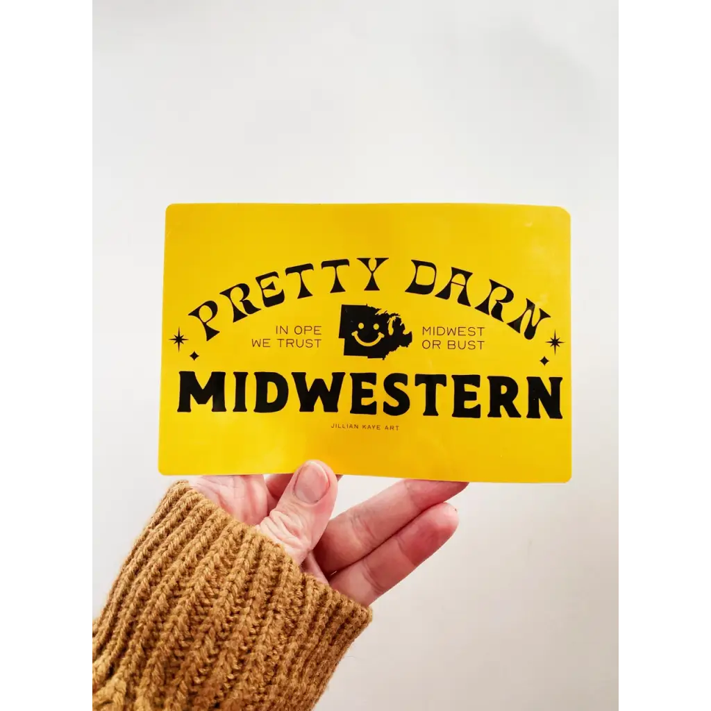 Yellow card with Pretty Darn Midwestern text and logo for fun bumper sticker vibe