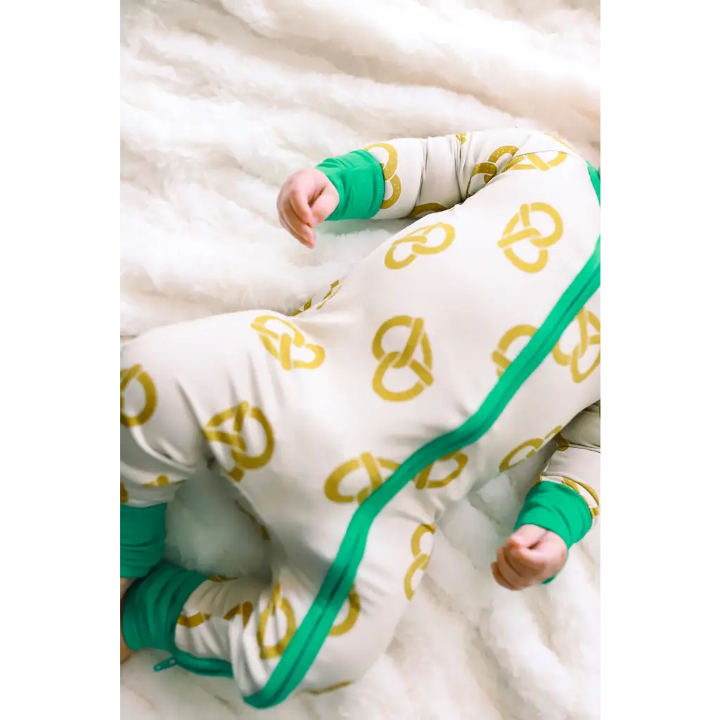 Baby sleeper with yellow pretzel prints and green trim from Pretzel Party Bamboo collection