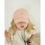 Pink kids ball cap featuring a cute rainbow patch for cheerful little adventures