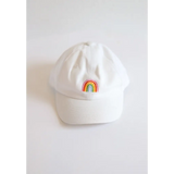 White kids ball cap with colorful rainbow patch, perfect for little adventures