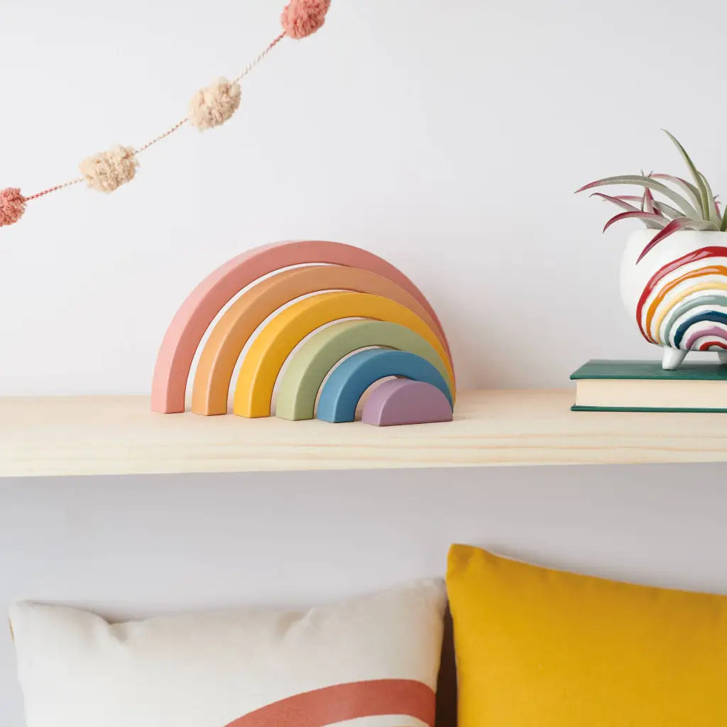 Colorful pastel rainbow nesting puzzle stacking toy for kids play and learning