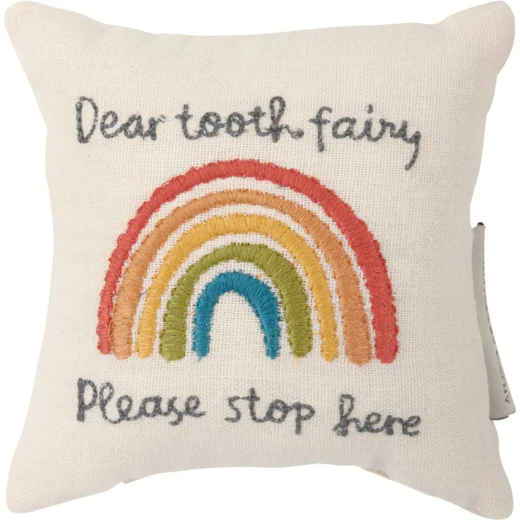 Rainbow tooth fairy pillow in cream with colorful rainbow and gray Dear Tooth Fairy text