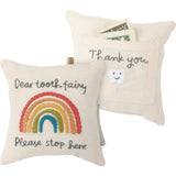 Cream-colored rainbow tooth fairy pillow with embroidered text
