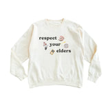 Respect your elders cream pullover with polished prints and broken-in feel