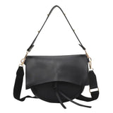 Black saddlebag-style purse, Roxie Saddle Crossbody Bag, perfect for stylish womens clothes