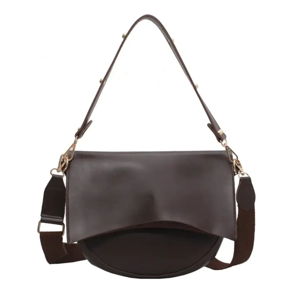 Brown leather Roxie Saddle Crossbody Bag perfect for stylish womens clothes and polished prints