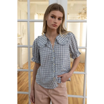 Light blue gingham blouse with soft ruffle collar and puffed sleeves