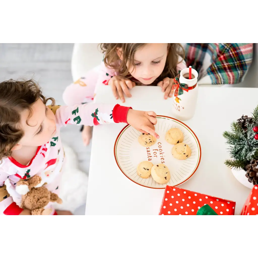 White Santa cookie plate with red green holiday design and cookies for santa text
