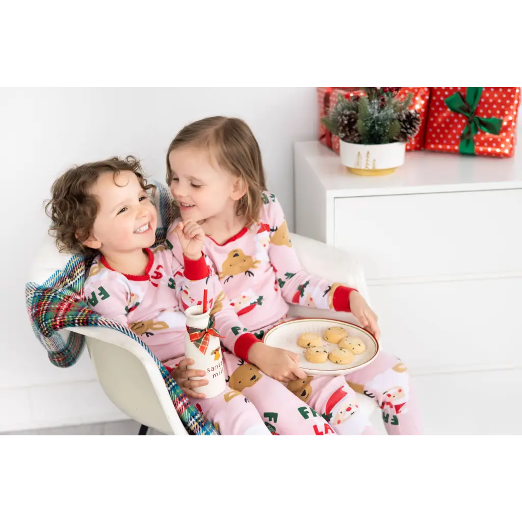 Festive pink reindeer cotton pajama set with cookie plate holiday vibes