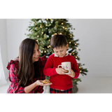 Festive red plaid pajama set with cookie slot mug display