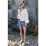 White Scalloped floral cutout button blouse with lace and bell sleeves