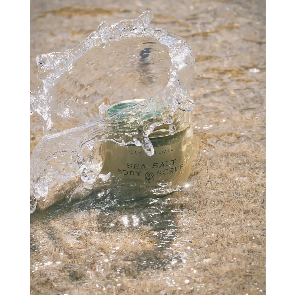 Sea salt body scrub with green tea in glass bottle