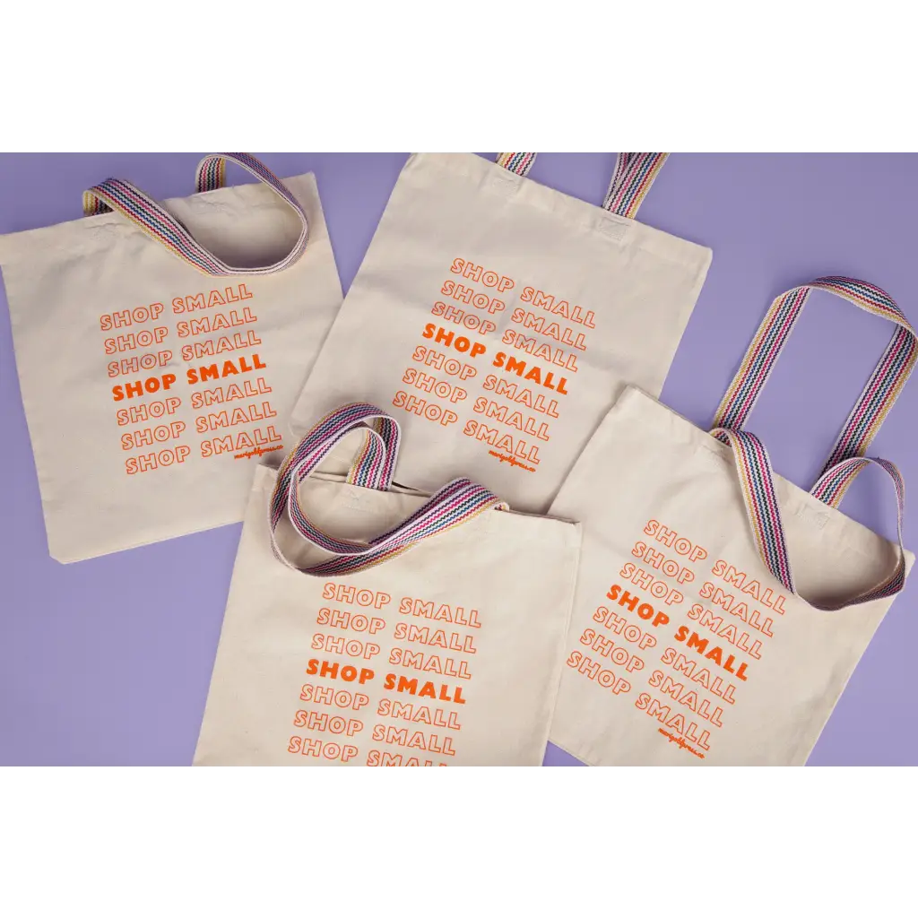 Shop small recycled cotton tote bag with stylish striped handles for eco-friendly shopping