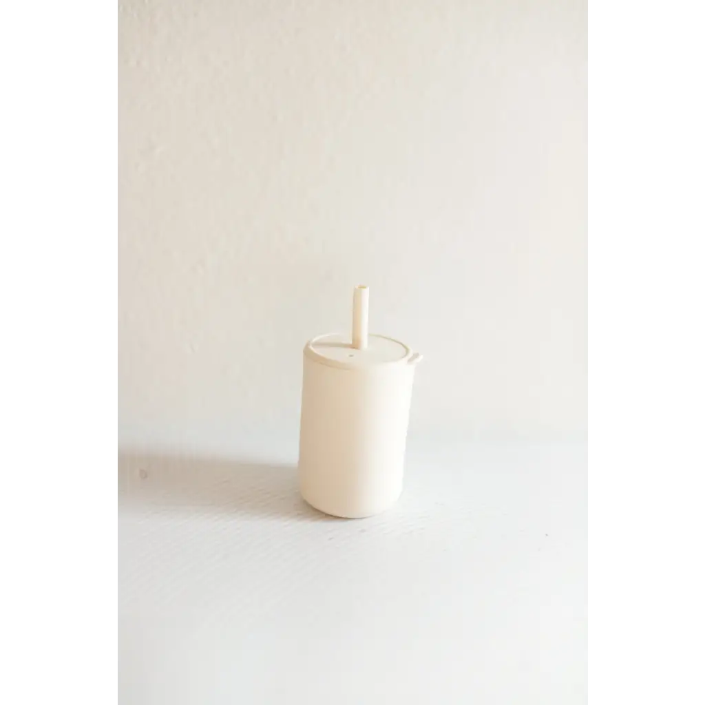 White ceramic vessel with a mini silicone straw from Pastel Mini Silicone Straw Cups