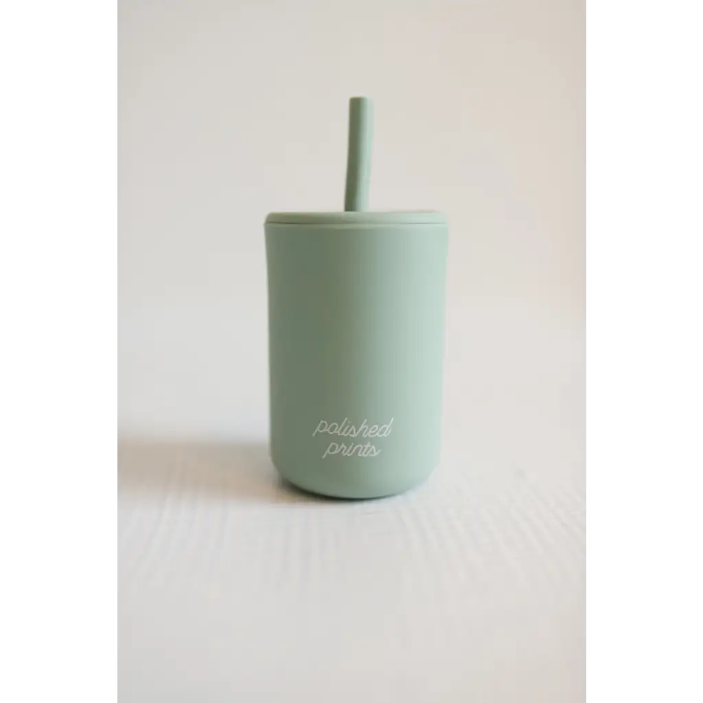 https://polished-prints.com/cdn/shop/files/silicone-straw-cup-with-lid-seafoam-green-597_1800x1800.webp?v=1687289954