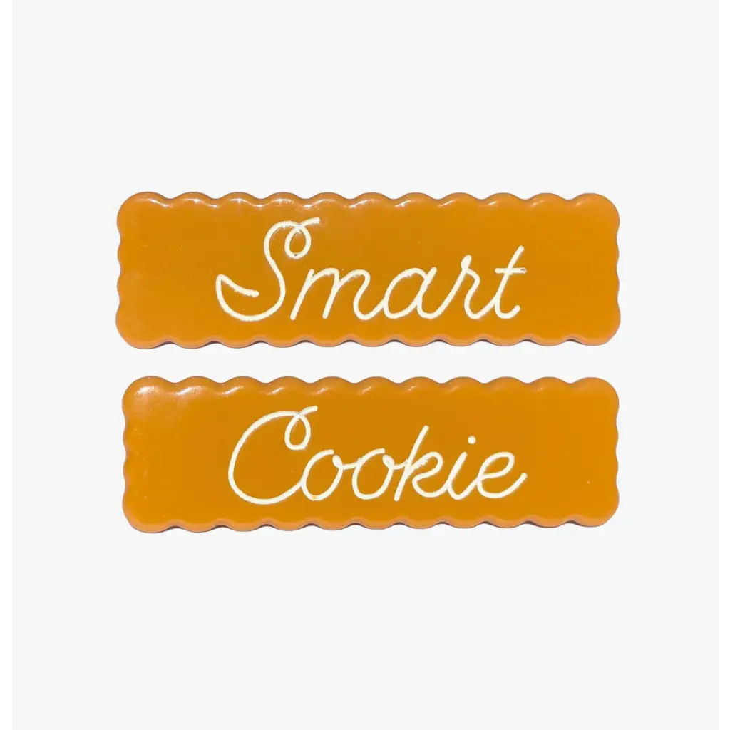 Two orange cookies with Smart Cookie text for Cute Smart Cookie Hair Clips