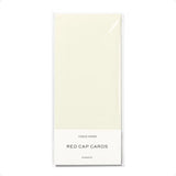 Cream-colored tissue paper sheets by Red Cap Cards for stylish womens clothes and more
