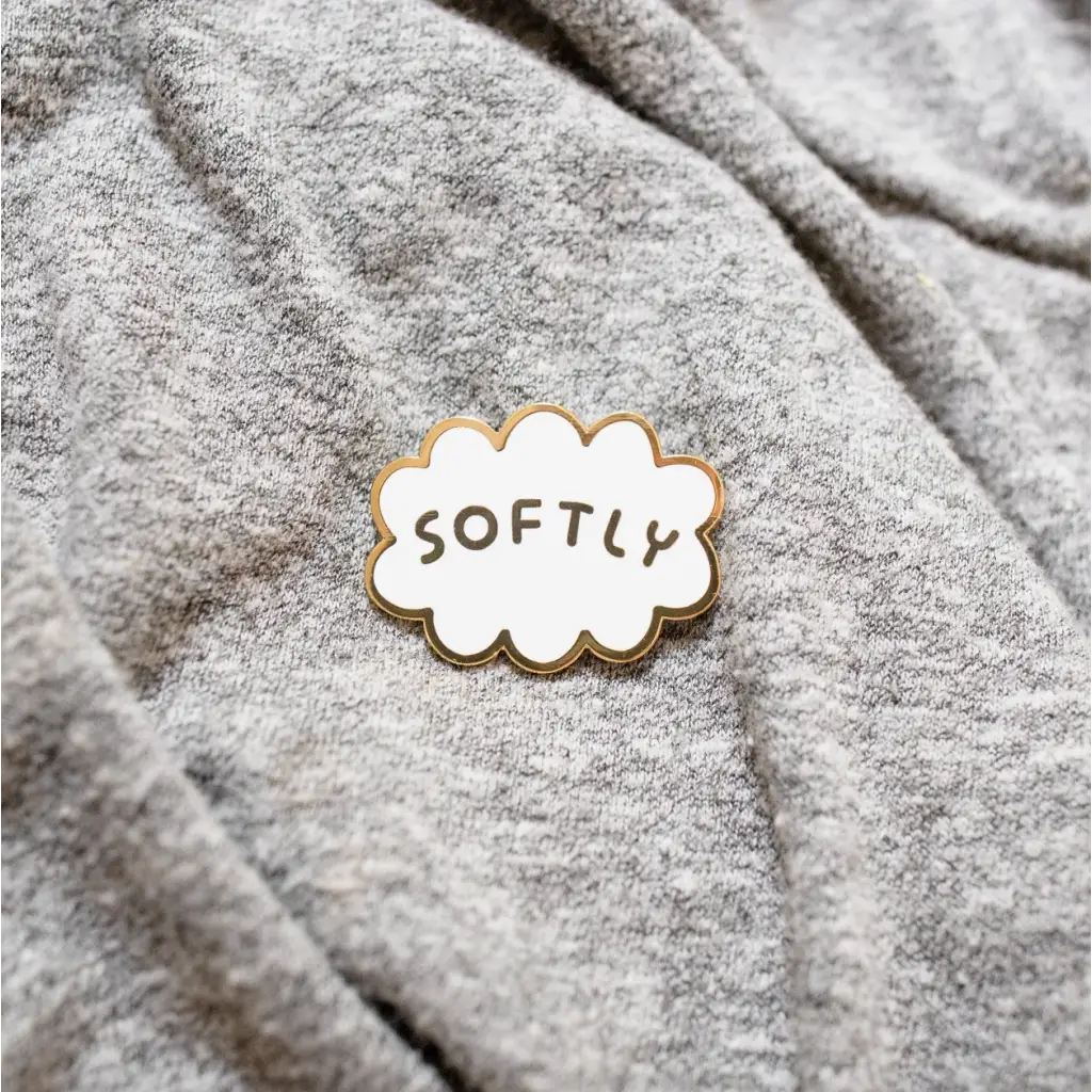 White cloud-shaped softly enamel pin with gold trim perfect for cute accessories