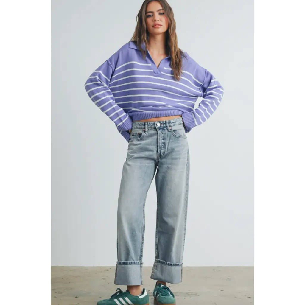 Person rocking a purple striped cropped sweater and light wash wide-leg jeans, perfect stylish womens clothes